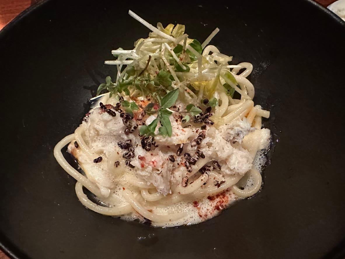 Dungeness crab linguine with shaved fennel, sprouts, lemon, and a light cream sauce