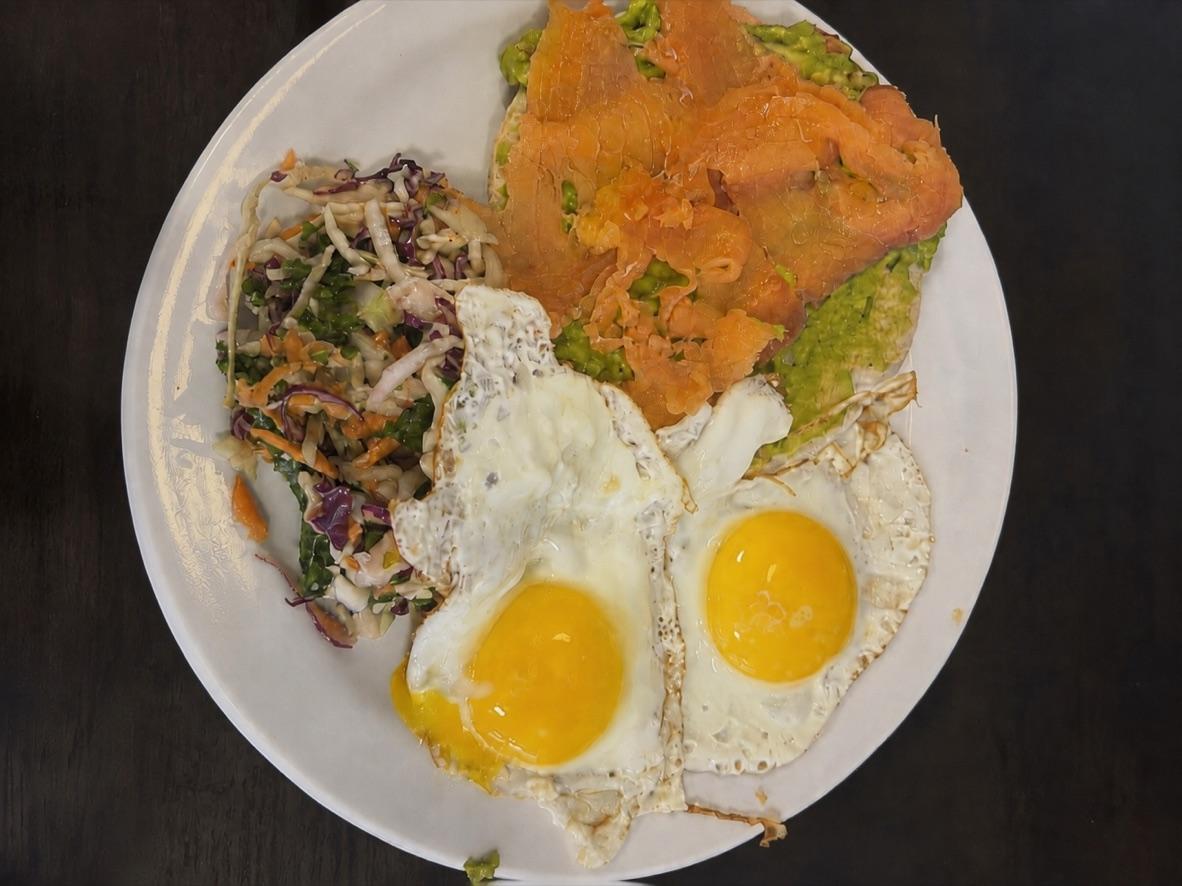 Smoked Salmon Avocado Toast with Fried Eggs and Kale Slaw