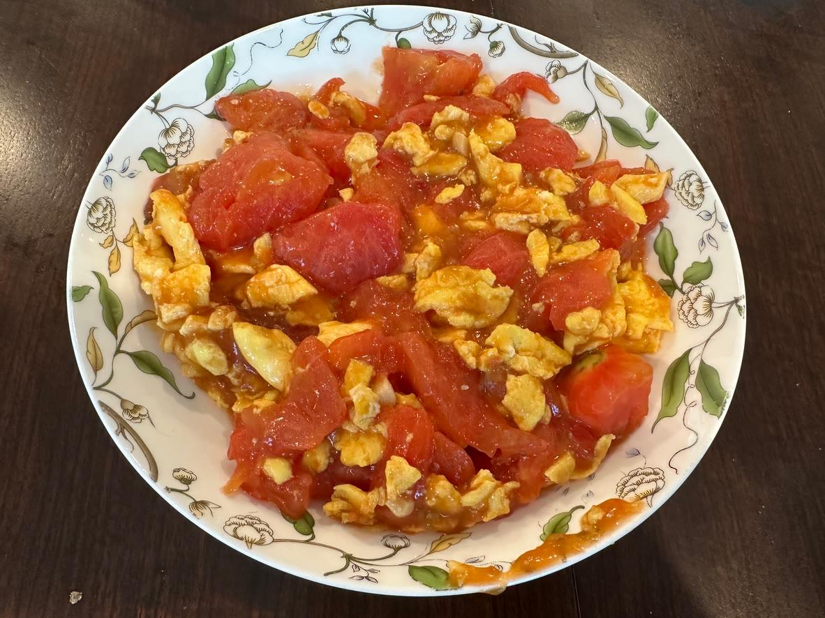 Chinese tomato and egg stir-fry with soft scrambled eggs and juicy tomato wedges