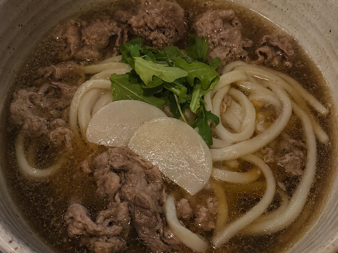 Japanese beef udon with daikon and greens