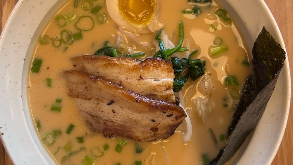 Tonkotsu ramen with chashu, a marinated egg, scallions, and nori